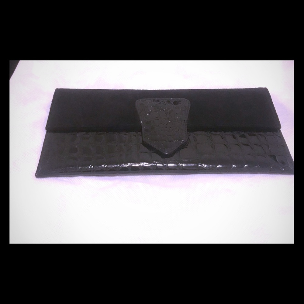 Patent leather and suede clutch by bebe